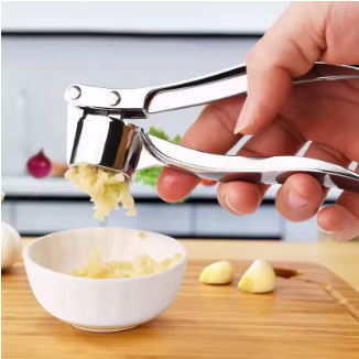 Multifunction garlic and ginger press for home cooking.